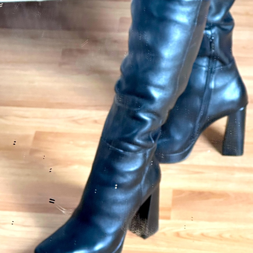 Tall black boots worn once